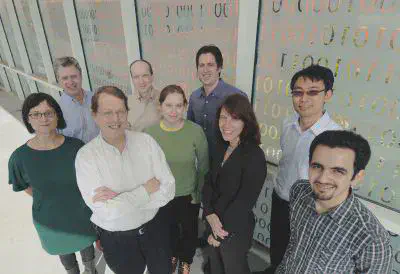 Researchers from Georgia Tech are helping to create a suite of algorithms that can detect multiple types of insider threats by analyzing massive amounts of data for unusual activity. The Georgia Tech research team includes (left-right) Erica Briscoe, Andy Register, David A. Bader, Richard Boyd, Anita Zakrzewska, Oded Green, Lora Weiss, Edmond Chow and Oguz Kaya. *(Credit: Gary Meek)*