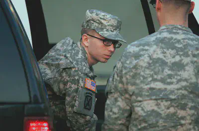 Pfc. Bradley Manning is escorted to a courthouse in December 2011. His alleged disclosures to WikiLeaks kickstarted Pentagon interest in catching so-called "insider threats." Photo: Patrick Semansky/AP.