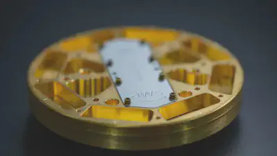 A microwave package encloses the AWS quantum processor. The packaging is designed to shield the qubits from environmental noise while enabling communication with the quantum computer’s control systems. Source: AWS