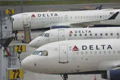 Delta Airlines passenger jets are pictured outside Terminal C at LaGuardia Airport in New York, June 1, 2022. Mike Segar/Reuters, FILE