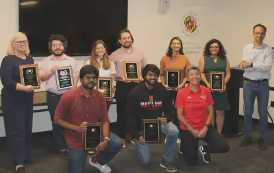 Front row (l to r): Adarsh Jagan Sathyamoorthy, Gershom Devake Seneviratne, Sennur Ulukus. Back row (l to r): Darcy Long, Michael Pedowitz, Ariana Spalter, Andrew Goffin, Priyanka Kaswan Sanghamitra Dutta, Dinesh Manocha
