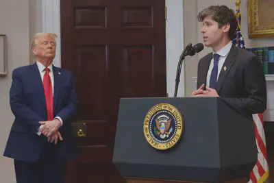 President Donald Trump looking toward OpenAI CEO Sam Altman, as Altman speaks to reporters at the White House. "This means we can create AI and AGI in the United States of America," OpenAI CEO Sam Altman said of President Donald Trump's new AI infrastructure project, Stargate. *Andrew Harnik via Getty Images*