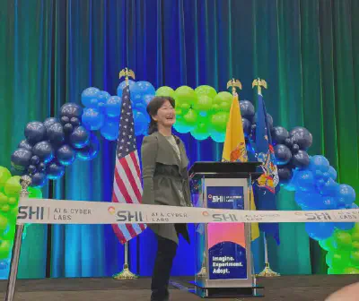 Thai Lee speaks at the recent opening of the AI Labs in New Jersey. *SHI*