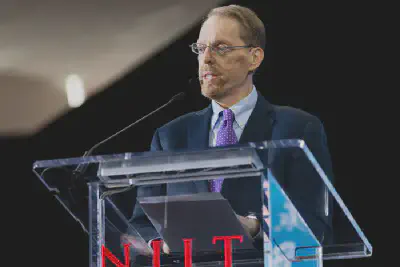 **David Bader**, distinguished professor and director of the Institute for Data Science at NJIT, moderated a panel discussion about how artificial intelligence is reshaping the way organizations work, compete and make decisions. *Credit: Courtesy of New Jersey Institute of Technology*