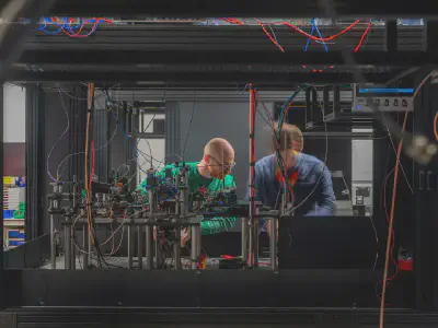 Scientists working on a neutral atom quantum computer at the National Quantum Computing Centre in Didcot. *Photographer: Tom Skipp/Bloomberg*